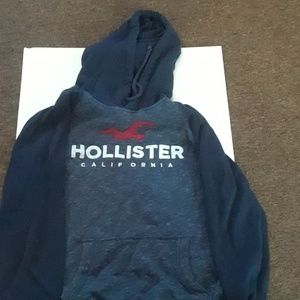 A Hollister grayish blueish hoodie